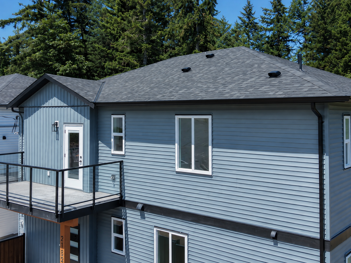 Upper Unit 200 at the blue 2188 Jingle Pot Road residence